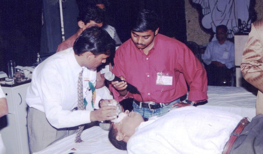 Doctors examining a patient at an early eye camp
